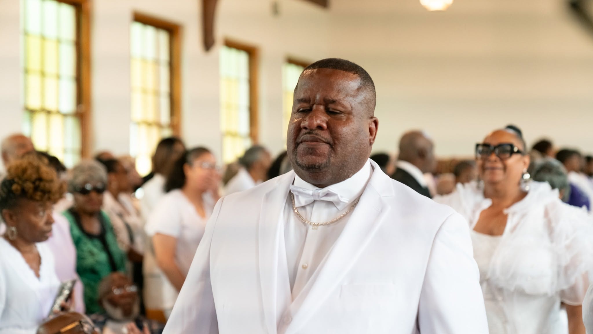 Eyes closed, heart open — a man of God deep in worship